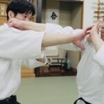 The Aikido Master teaches self-defense to the Karate man! How to gently control your opponent.